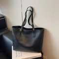Classic black leather tote bag with pleated texture and New York fashion lettering - Black