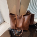 Dark brown leather tote bag with New York print and long shoulder straps - Brown