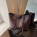 Dark brown tote bag with leather texture and New York embossed logo for women - Brown