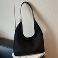 Retro black suede hobo shoulder bag with a sleek minimalist design and leather strap - Black