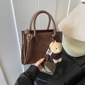Retro deep brown leather satchel with dual handles and a cute plush bear charm - With Pendant / Brown