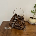 Fashionable leopard print bucket bag with silver metal ring handle and chain tassel details - Brown