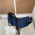 Blue leopard print denim crescent bag with knotted rope handles and metal details - Blue