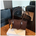 Deep brown quilted tote bag with vintage wood bead charm on a long shoulder strap - Coffee with Pendant