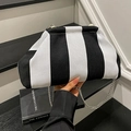 Handheld black and white striped canvas crossbody bag with elegant silver chain strap - Black