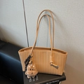 Vintage brown woven tote bag with long handles and a cute plush puppy pendant - Khaki