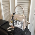 Contrast stitching crossbody bag in beige leather and landscape canvas with gold flower clasp - Khaki