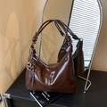 Glossy dark brown hobo bag with knotted strap and metal ring detail in vintage style - Coffee (With Pendant)