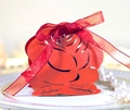 Laser-cut red rose wedding favor box with silk ribbon bow on white jewelry tray - Pearlescent Red