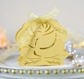 Detailed laser-cut yellow hollow paper gift box featuring exquisite rose patterns and silk ribbon - Gold