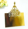 Elegant gold laser-cut table card featuring a crown princess silhouette and floral lace design - Reflective Gold