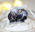 Detail of laser-cut rose candy box in silver metallic cardstock with a white silk bow - Reflective Silver