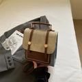 Sac rétro bicolore en daim beige et cuir marron avec détails latéraux en denim bleu - Bleu