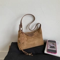 Brown suede hobo bag with dark leather strap and a cute teddy bear charm detail - Brown