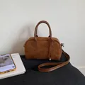 Brown faux suede Boston bag with leather handles and detachable shoulder strap - Brown