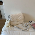 Elegant cream chain crossbody bag with V-quilted pattern and fluffy doll charm - With Pendant / White