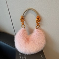 Pink plush crescent handbag with yellow wooden beads and woven shoulder strap - Pink