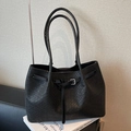 Large black woven texture tote bag with dual shoulder straps and metal buckle detail - Black