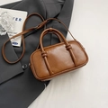 Vintage brown bowling bag with matte leather finish and detachable crossbody strap - No Pendant / Yellow Brown