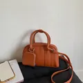 Caramel brown vintage Boston handbag with a matching small coin purse charm and logo - No Pendant / Caramel color