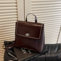 Minimalistischer Vintage-Rucksack aus dunkelbraunem Leder mit Perlenklappe und Drehverschluss - Kaffeebraun