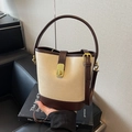 Cream suede and brown leather bucket bag with gold twist lock and adjustable strap - Off-white