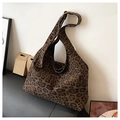 Hobo shoulder bag with dark leopard print pattern and adjustable gold metal buckle - Leopard Print