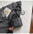 Sac seau noir texture tressée avec détails argentés et bandoulière réglable - Noir sans Pendentif