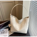 Minimalist beige oversized leather tote bag with a small coin purse and knot detail - Off-white