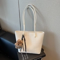 Cream white woven tote bag with V-shaped texture and a cute brown plush bear charm - Beige