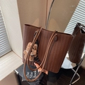 Chocolate brown woven leather tote bag with a cute plush bear pendant accessory - Brown