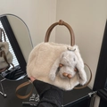 Plush cream crossbody bag with faux fur bunny pendant and brown leather handles - Apricot With Pendant