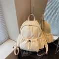 Chic cream nylon backpack with crinkle texture and multi-pocket design for travel - Off White