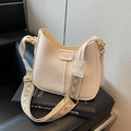 Minimalist cream white half-moon crossbody bag with decorative wide jacquard strap - White