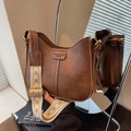 Brown vintage faux leather bucket bag with wide jacquard woven geometric shoulder strap - Brown