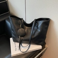 Large black tote bag with long handles and a matching round coin purse charm - Black