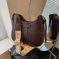 Dark brown retro bucket bag with wide ethnic pattern strap and matte leather finish - Brown