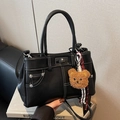 Vintage black top-handle handbag with white contrast stitching and a cute bear charm - With Charm / Black