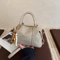 Taupe Boston style crossbody bag with embossed logo and leopard print bead charm - Beige Grey