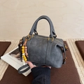Vintage grey Boston handbag in matte finish with beaded keychain and golden zipper - Black