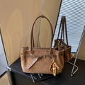 Retro brown suede tote bag featuring ethnic wood bead charm and metallic buckle accent - Brown
