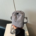Minimalist grey drawstring phone crossbody bag made of durable nylon fabric - Gray