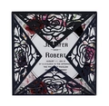 Close-up of laser-cut rose wedding invitation with elegant floral insert and detail - Black