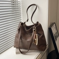 Retro dark brown underarm bag in distressed PU leather with ethnic beaded charm accessory - With Charm / Brown