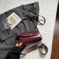 Chic burgundy leather crossbody bag with dual straps and elegant golden lettering - Wine Red Without Pendant