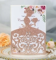 Detail of laser-cut rose gold glitter wedding invitation with bride silhouette and flowers - Glitter Champagne Gold