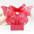 Detail of red laser-cut butterfly candy box with matching organza ribbon and bow - Pearlescent Red