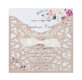 Detail of rose gold glitter laser cut wedding invitation with white ribbon and floral card - Apple Gold
