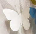 Deko-Schmetterling aus Papier in Himmelblau mit 3D-Hohlraum-Effekt für Wandgestaltung - Weiß