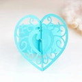 Light blue laser-cut heart paper napkin ring with intricate vine hollow-out patterns - Tiffany Blue